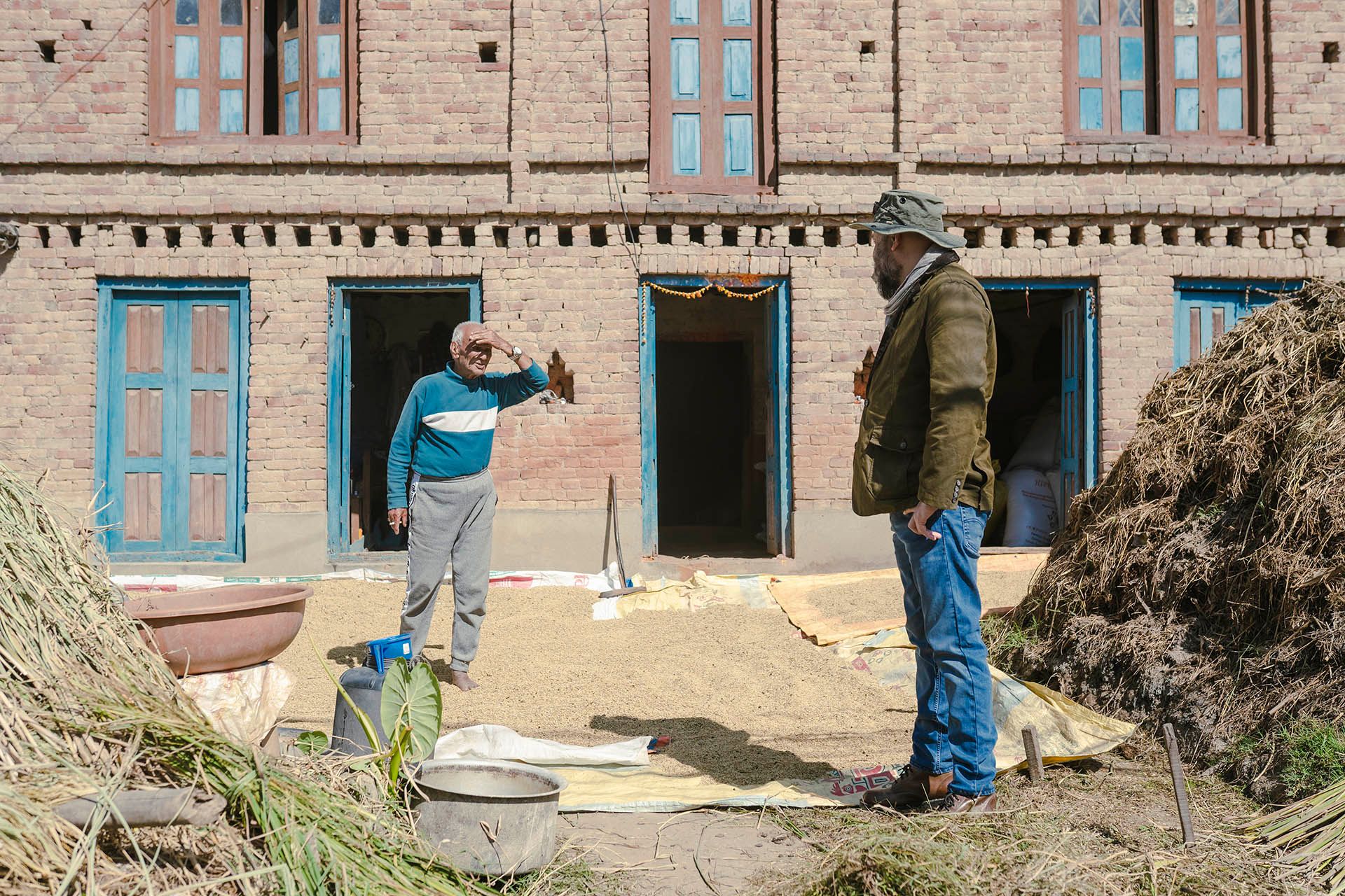 Sudip Pokhrel speaking with local in Kathmandu, Nepal